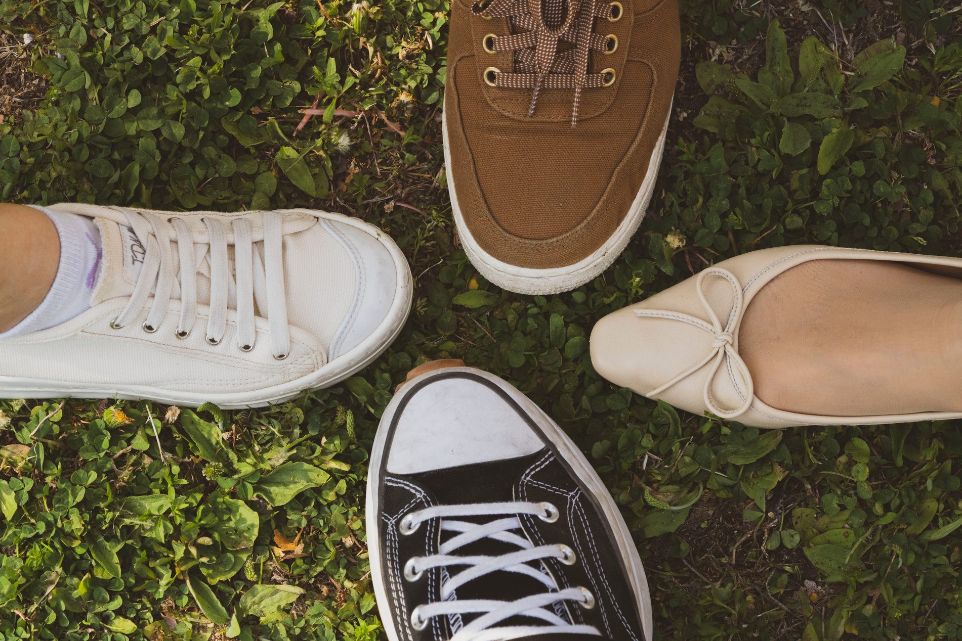 A Close-Up Shot of People Wearing Footwear