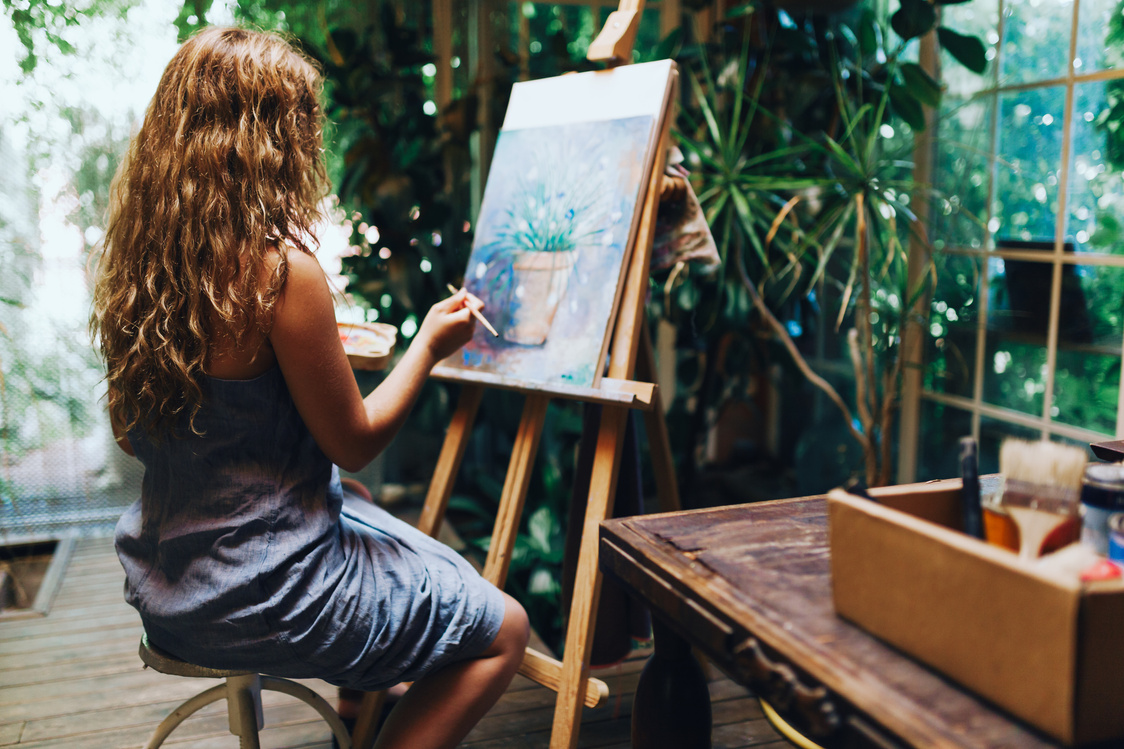 Woman Painter Painting in Her Painting Studio